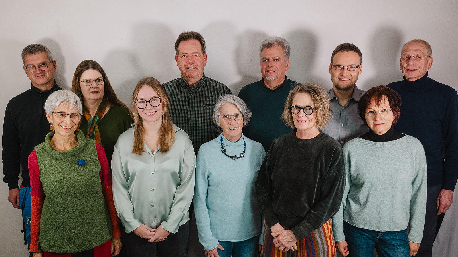 Kandidierende zur Kommunalwahl 2026. Obere Reihe von links nach rechts: Axel Bänsch, Karin Krüger, Rainer Pfeffermann, Carsten Sieberg, Hans Müller, Gerhard Hesse. Untere Reihe von links nach rechts: Olivia Maschke, Nelly Reuter, Dr. Barbara Weller, Silke Backhaus, Andrea Grimmell-Hesse.